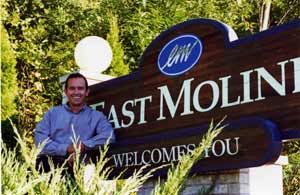 Mayor Joe Moreno in front of East Moline sign